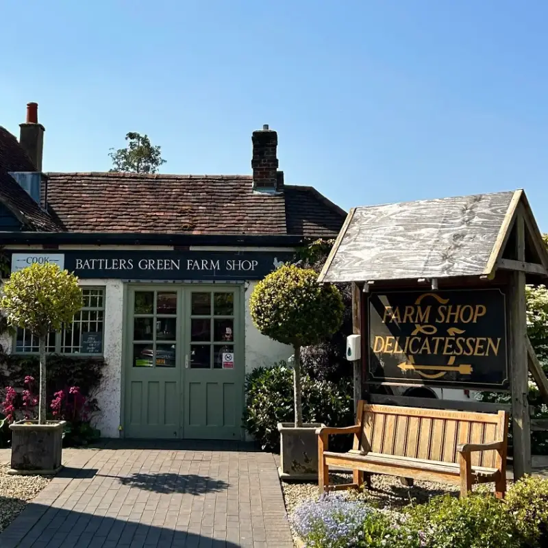 A scenic view of Battlers Green Farm shop at the shopping village in Radlett, Hertfordshire, featuring independent Radlett shops and local farm produce.